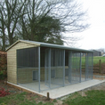 Load image into Gallery viewer, A multi-unit wooden dog kennel block with multiple runs. The structure is built with pressure-treated timber and features galvanized steel bar panels for the runs, with each unit having a separate, enclosed sleeping area. The kennel is designed for multiple dogs and is durable and secure.