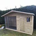 Load image into Gallery viewer, A Kennelstore 10x4 Elworth Apex Wooden Dog Kennel & Run. The pressure-treated outdoor shelter features a classic apex roof design and a secure galvanized steel run panel.