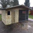 Load image into Gallery viewer, A Kennelstore 12x5 Elworth Apex Wooden Dog Kennel & Run. The pressure-treated outdoor shelter features a classic apex roof design and a secure galvanized steel run panel.