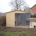 Load image into Gallery viewer, A multi-unit wooden dog kennel block with multiple runs. The structure is built with pressure-treated timber and features galvanized steel bar panels for the runs, with each unit having a separate, enclosed sleeping area. The kennel is designed for multiple dogs and is durable and secure.