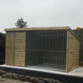 Load image into Gallery viewer, Wooden Dog Kennel & Outdoor Run made with pressure treated timber. The image shows a durable, weather-resistant kennel providing a secure outdoor space for a dog.