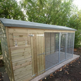 Load image into Gallery viewer, Apex Wooden Dog Kennel and Run. The weatherproof outdoor shelter features a classic apex roof and is constructed with durable timber to provide a secure and comfortable home for a dog.