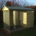 Load image into Gallery viewer, A Kennelstore 10x4 Wymbury Wooden Dog Kennel and Run. The spacious outdoor shelter is built with durable timber to provide a secure and comfortable home for a dog.
