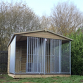 Load image into Gallery viewer, A large, 6x9 wooden Kennelstore Wymbury Double Dog Kennel and Run, featuring a classic apex roof. The kennel is constructed with durable, pressure-treated tanalised timber and includes galvanised steel panels, making it ideal for housing and separating multiple dogs securely.