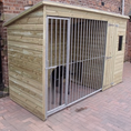 Load image into Gallery viewer, Wooden Dog Kennel & Run. The pressure-treated outdoor shelter features a durable timber frame, a secure galvanized steel run, and a pent roof designed to shed rain.