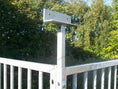 Load image into Gallery viewer, Close-up of pre-drilled holes on galvanised steel roof bracket for dog pen