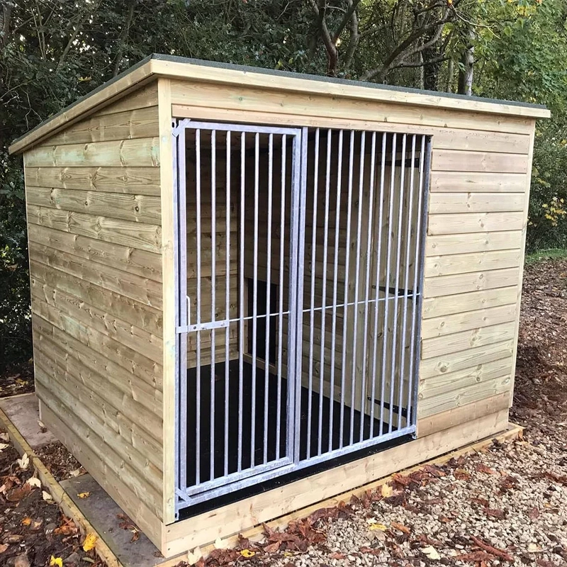 A Kennelstore Chesterfield Wooden Dog Kennel & Run. The weatherproof outdoor shelter features a durable timber sleeping area and a rust-resistant galvanised steel run panel.