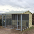 Load image into Gallery viewer, A multi-unit wooden dog kennel block with multiple runs. The structure is built with pressure-treated timber and features galvanized steel bar panels for the runs, with each unit having a separate, enclosed sleeping area. The kennel is designed for multiple dogs and is durable and secure.
