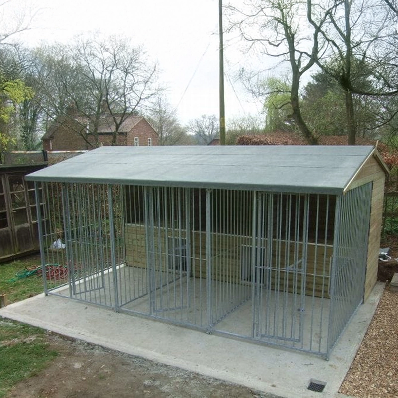 A multi-unit wooden dog kennel block with multiple runs. The structure is built with pressure-treated timber and features galvanized steel bar panels for the runs, with each unit having a separate, enclosed sleeping area. The kennel is designed for multiple dogs and is durable and secure.