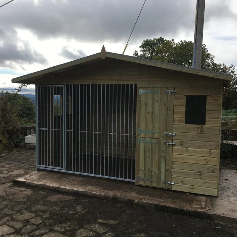 A Kennelstore 10x4 Elworth Apex Wooden Dog Kennel & Run. The pressure-treated outdoor shelter features a classic apex roof design and a secure galvanized steel run panel.