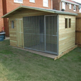 Load image into Gallery viewer, A Kennelstore 10x6 Elworth Apex Wooden Dog Kennel & Run. The pressure-treated outdoor shelter features a classic apex roof design and a secure galvanized steel run panel.
