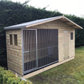 Load image into Gallery viewer, A Kennelstore 12x4 Elworth Apex Wooden Dog Kennel & Run. The pressure-treated outdoor shelter features a classic apex roof design and a secure galvanized steel run panel.
