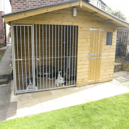 A Kennelstore 10x4 Elworth Apex Wooden Dog Kennel & Run. The pressure-treated outdoor shelter features a classic apex roof design and a secure galvanized steel run panel.