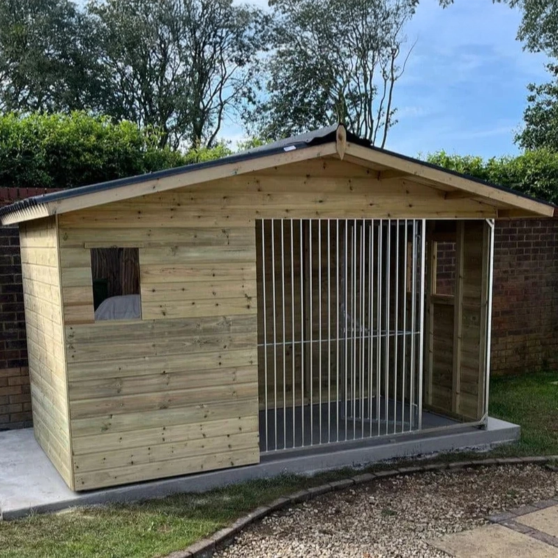 A Kennelstore 10x5 Elworth Apex Wooden Dog Kennel & Run. The pressure-treated outdoor shelter features a classic apex roof design and a secure galvanized steel run panel.