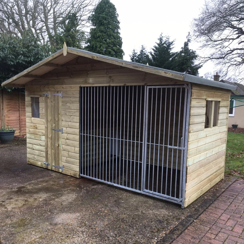 A Kennelstore 12x5 Elworth Apex Wooden Dog Kennel & Run. The pressure-treated outdoor shelter features a classic apex roof design and a secure galvanized steel run panel.