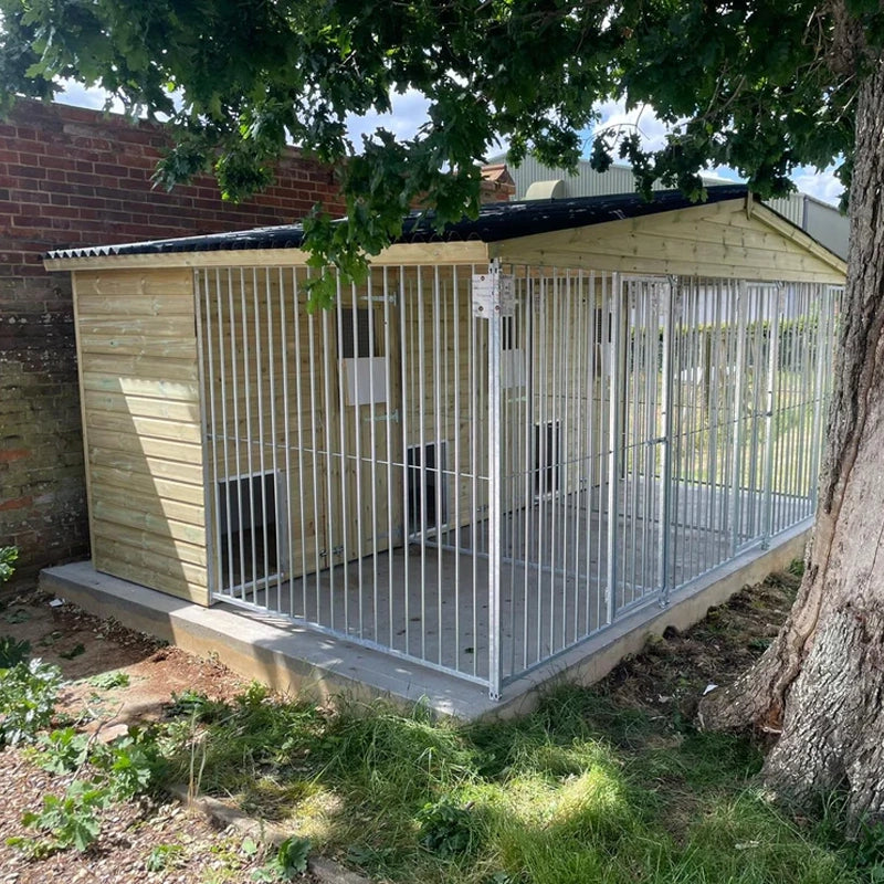 A multi-unit wooden dog kennel block with multiple runs. The structure is built with pressure-treated timber and features galvanized steel bar panels for the runs, with each unit having a separate, enclosed sleeping area. The kennel is designed for multiple dogs and is durable and secure.