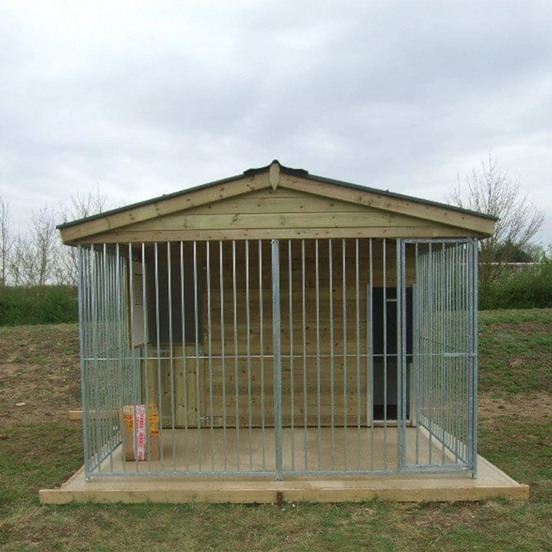 Large metal dog kennel with wooden roof on a grassy field