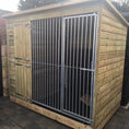 Load image into Gallery viewer, A Kennelstore 8x4 Stapeley Wooden Dog Kennel & Run. The pressure-treated outdoor shelter features a durable timber frame, a secure galvanized steel run, and a pent roof designed to shed rain.
