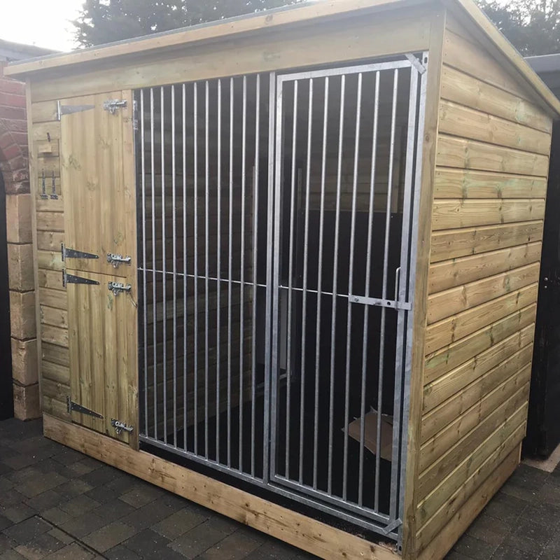 A Kennelstore 8x4 Stapeley Wooden Dog Kennel & Run. The pressure-treated outdoor shelter features a durable timber frame, a secure galvanized steel run, and a pent roof designed to shed rain.