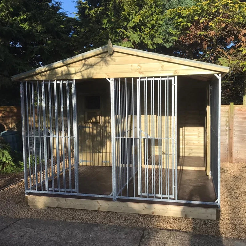 A large, 10x12 wooden Kennelstore Wymbury Double Dog Kennel and Run, featuring a classic apex roof. The kennel is constructed with durable, pressure-treated tanalised timber and includes galvanised steel panels, making it ideal for housing and separating multiple dogs securely.